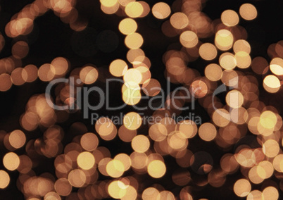 Golden bokeh glittering bright abstract background