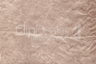 Brown blank crumpled and grungy textured paper background