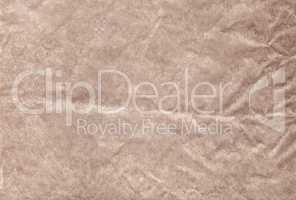 Brown blank crumpled and grungy textured paper background