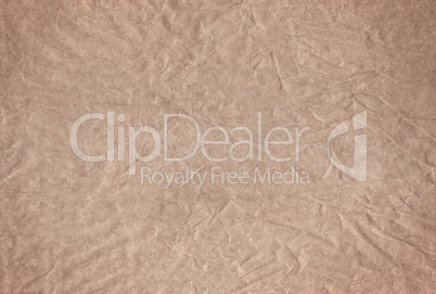 Brown blank crumpled and grungy textured paper background