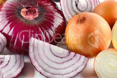 Background of red and white onions. A food set.