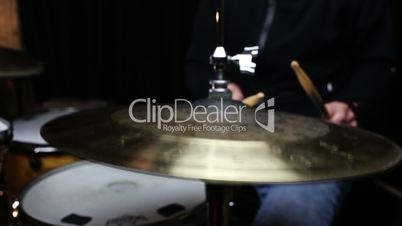 Drummer Playing Drums and Cymbals in Music Studio