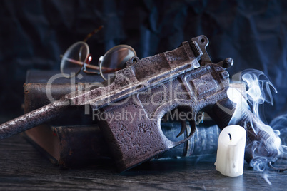 Old Pistol Near Candle