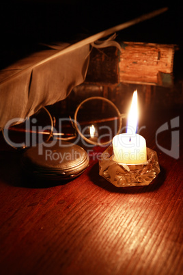 Lighting Candle Near Clock