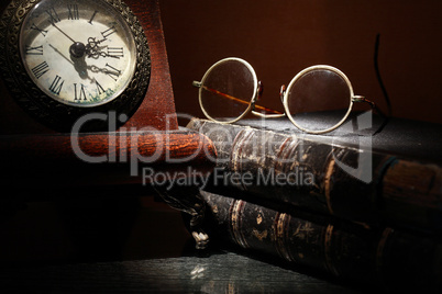 Old Clock And Books