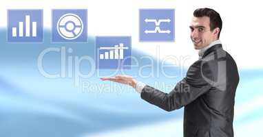 Businessman interacting with business chart statistic icons
