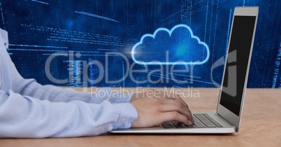Hands using laptop and cloud icon with technology background