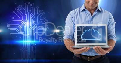 Hands holding laptop with cloud icon and technology background