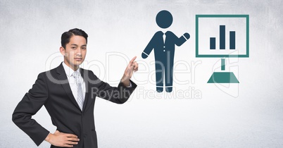 Businessman pointing at presentation screen chart icon