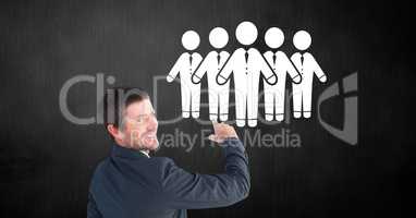 Businessman pointing at business people group icon