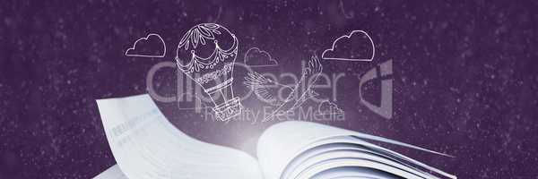 Opened books with light and drawings on purple background
