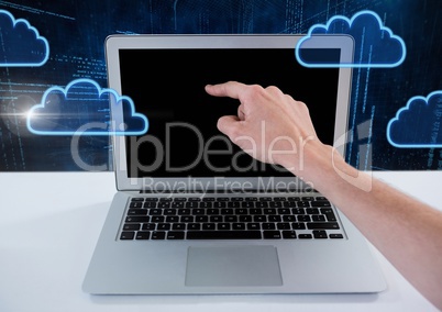 Hand using laptop with cloud icons and technology background