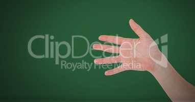Hand open with fingers on green background