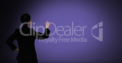 Businessman pointing on purple