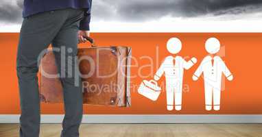 Businessman with briefcase and people meeting icon on wall