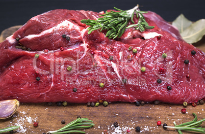 raw beef tenderloin with pepper