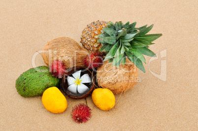 Set of tropical fruits on a sandy beach. Sri Lanka.