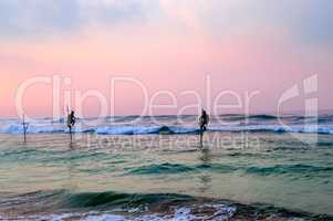 Traditional stilt fishermen in Sri Lanka.