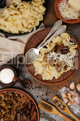Pasta fettuccine with mushrooms and meat