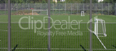 football field near fence at day sunny day