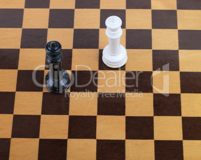 wooden checkerboard with figures