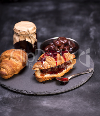 baked croissants and strawberry jam