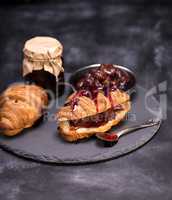 baked croissants and strawberry jam