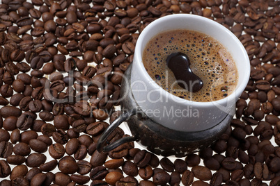 Close up of traditional Turkish coffee - Coffee beans background