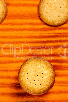 Homemade cookies on orange cloth.