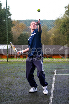 Male playing Tennis