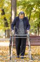 Woman with walker walking outdoors