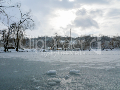 Evening on an frozen lake ice snowy