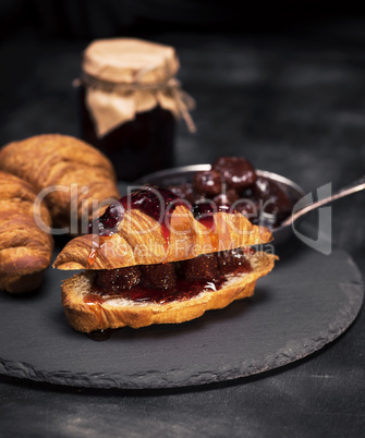 croissant with strawberry filling and jam