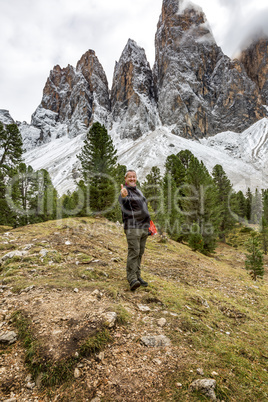 Man hiking in the nature park Geisler-Puez in South Tyrol