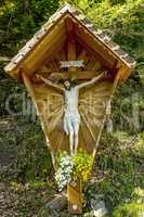 Wooden cross with figure