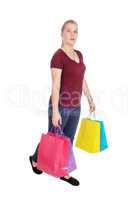 Woman walking with colorful shopping bags