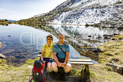 Break from hiking on the lake at the Astjoch in South Tyrol