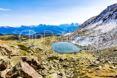 Mountain landscape with lake at Astjoch