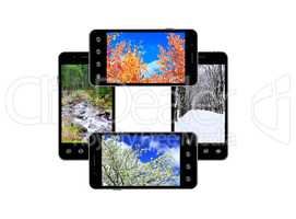 Modern mobile phones with images of four seasons