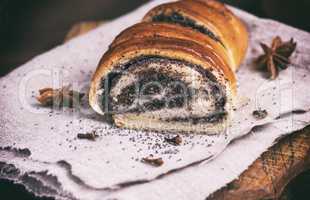 baked roll with poppy seeds