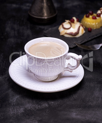 White ceramic cup with black coffee