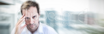 Composite image of portrait of man with headache