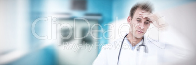 Composite image of upset male doctor touching forehead