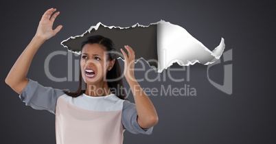 Stressed and upset woman with torn paper