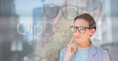 Businesswoman with double exposure effect