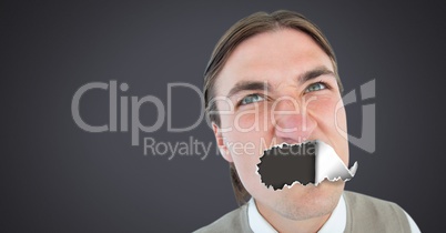 Man with torn paper on mouth