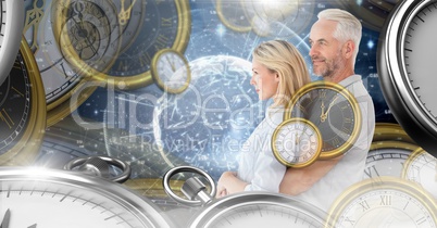 Aging couple in surreal time montage of clocks