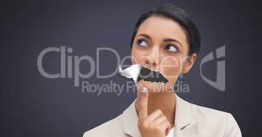 Woman with torn paper on mouth