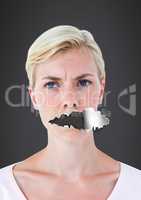 Woman with torn paper on mouth