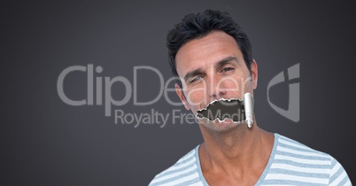 Man with torn paper on mouth Man with torn paper on mouth